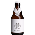 A bottle of KAGUA Blanc beer in an amber glass bottle with a white label and white cap, shown on a plain white background.