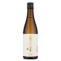 A single bottle of Japanese sake on a plain white background. The bottle is made of amber glass with a black cap and a white label featuring gold calligraphy and a small red seal.