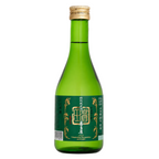 A green glass bottle of Japanese sake with a gold cap and a dark green label featuring gold Japanese characters, shown on a white and gray checkered background.